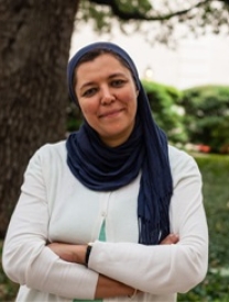 Photo Of Radwa El Barouni Standing In Front Of A Tree
